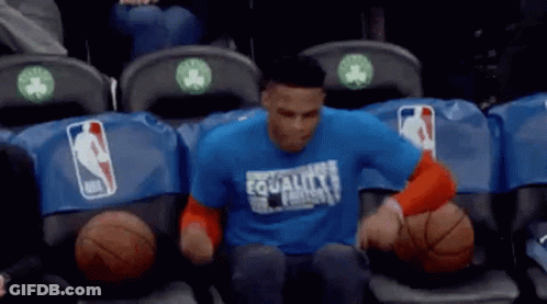 Man In Blue Shirt In Basketball Locker Room GIF