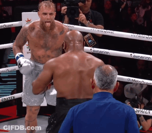 Man In Blue Shirt In Boxing Ring GIF