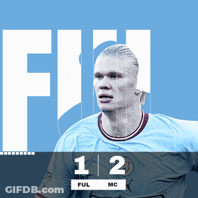 Man In Blue Shirt In Front Of Number 12 GIF