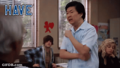 Man In Blue Shirt In Front Of Sign Saying Have GIF