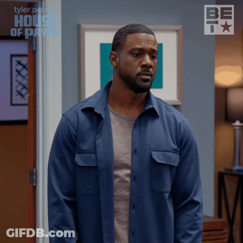 Man In Blue Shirt In Front Of Tyler Perry House Of Payne Door GIF