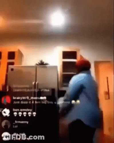 Man In Blue Shirt In Kitchen GIF