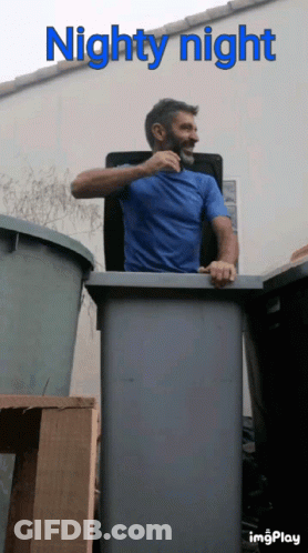 Man In Blue Shirt In Trash Can Saying Nighty Night GIF