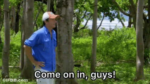 Man In Blue Shirt In Woods Saying Come On In Guys GIF