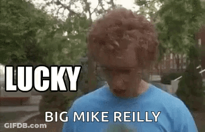 Man In Blue Shirt Looking Down Eyes Closed GIF