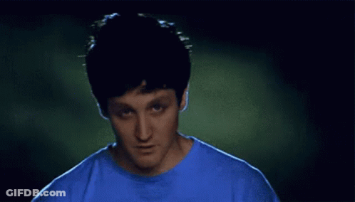 Man In Blue Shirt Making A Face GIF