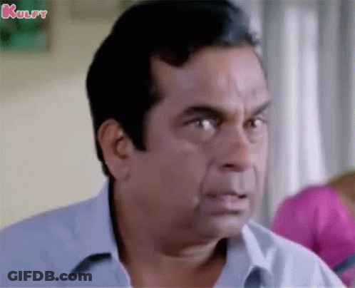 Man In Blue Shirt Making Funny Face GIF