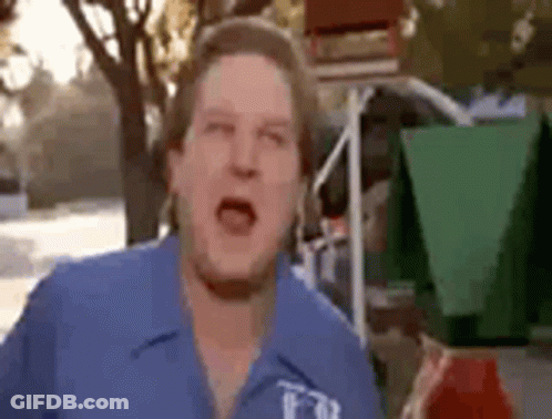 Man In Blue Shirt Making Funny Face GIF