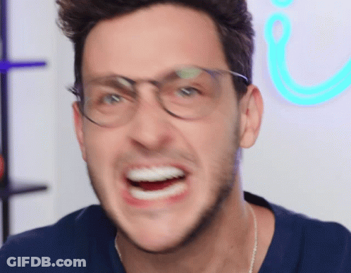 Man In Blue Shirt Making Funny Face GIF