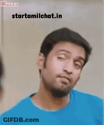 Man In Blue Shirt Making Funny Face With Starttamilchat.in GIF