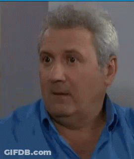 Man In Blue Shirt Making Funny Face GIF