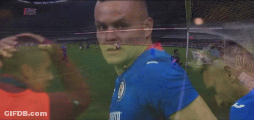 Man In Blue Shirt Making Heart GIF
