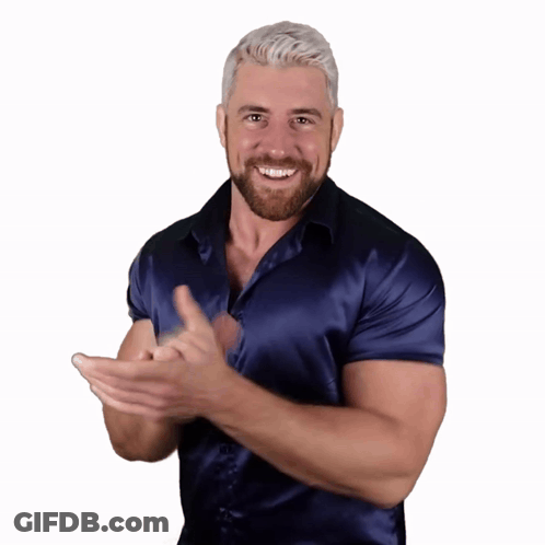 Man In Blue Shirt Making Heart With Hands GIF