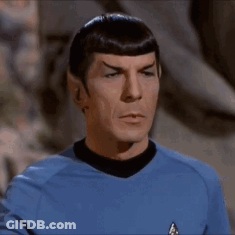 Man In Blue Shirt Making Stop Gesture GIF
