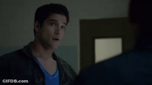 Man In Blue Shirt Next To Another Man GIF