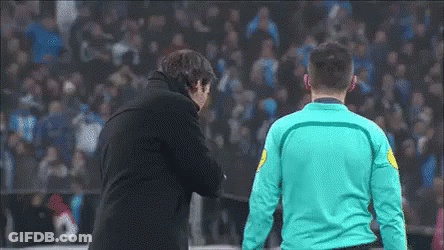 Man In Blue Shirt Next To Man In Black Jacket GIF