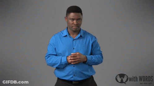 Man In Blue Shirt Next To Sign With Words GIF