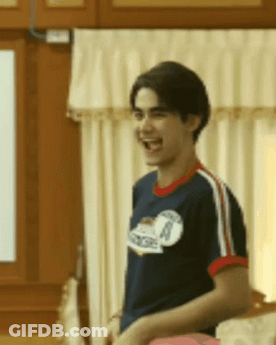 Man In Blue Shirt Number 8 Laughing GIF