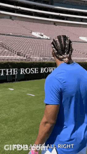 Man In Blue Shirt On Football Field GIF