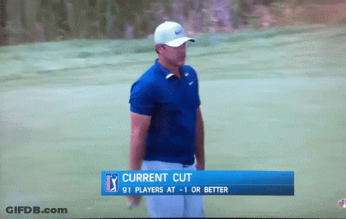 Man In Blue Shirt On Golf Course With Current Cut Banner GIF