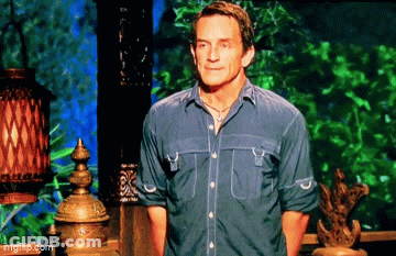 Man In Blue Shirt On Green Background GIF