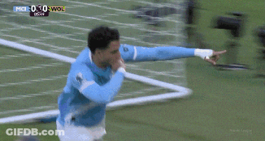 Man In Blue Shirt On Soccer Field With Sky Sports Logo GIF