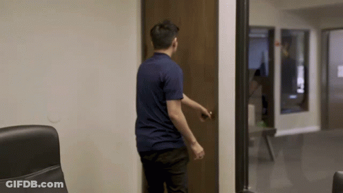 Man In Blue Shirt Opening Door GIF