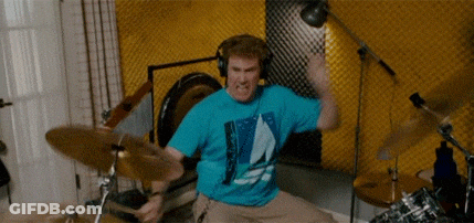 Man In Blue Shirt Playing Drums GIF