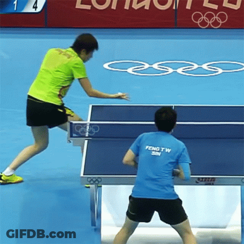 Man In Blue Shirt Playing Ping Pong GIF