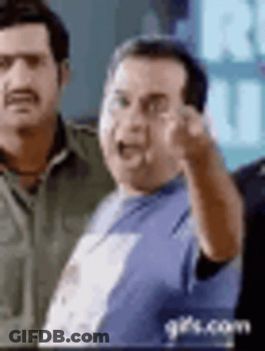 Man In Blue Shirt Pointing At Camera Next To Another Man GIF