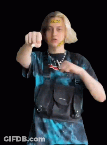 Man In Blue Shirt Pointing At Camera With Black Bag GIF