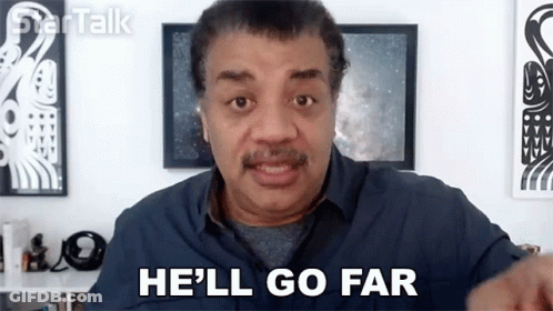 Man In Blue Shirt Pointing Saying He'll Go Far GIF
