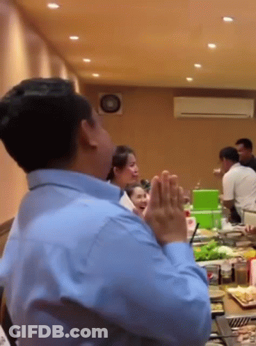 Man In Blue Shirt Praying GIF