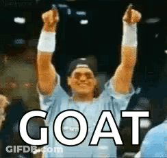 Man In Blue Shirt Raising Arms With Goat GIF