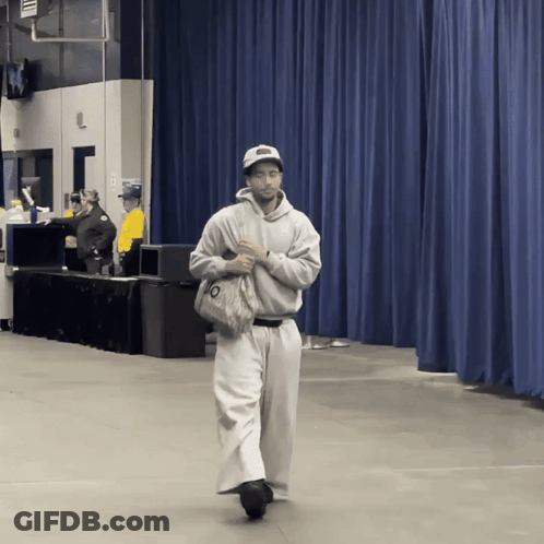 Man In Blue Shirt Reaching Out GIF
