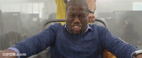 Man In Blue Shirt Riding Roller Coaster GIF