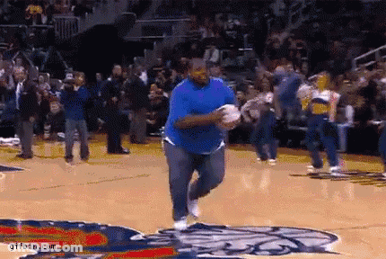 Man In Blue Shirt Running On Basketball Court GIF