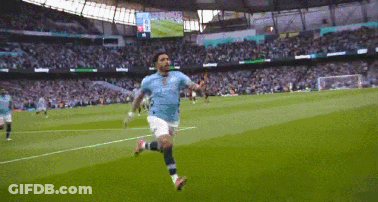 Man In Blue Shirt Running On Soccer Field GIF