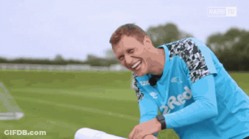 Man In Blue Shirt Saying 2 Red Laughs GIF