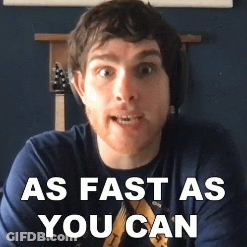 Man In Blue Shirt Saying As Fast As You Can GIF