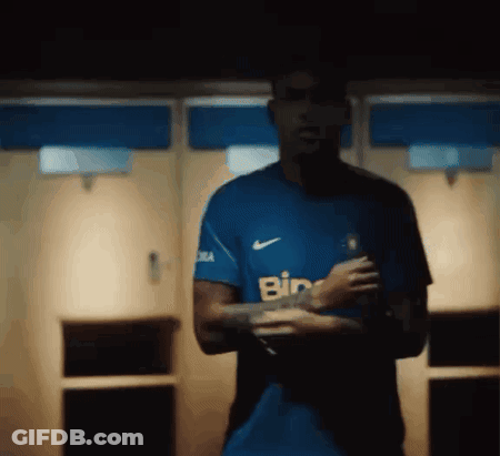 Man In Blue Shirt Saying Bin GIF
