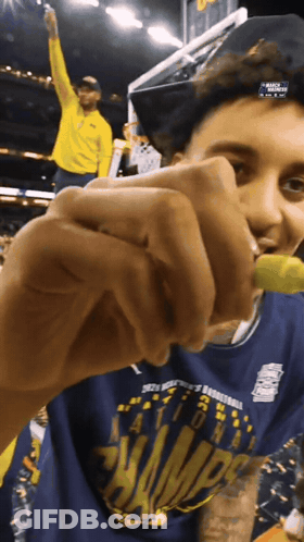 Man In Blue Shirt Saying Champions GIF