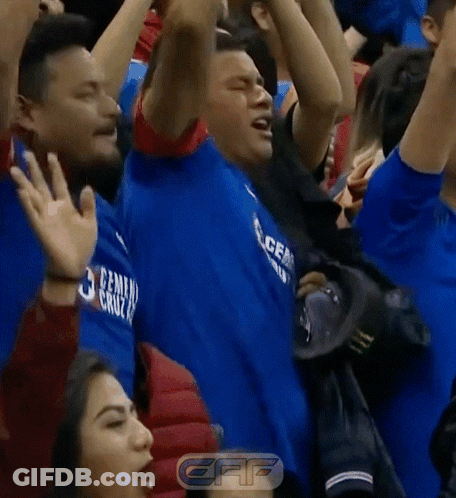 Man In Blue Shirt Saying Cruz In Crowd GIF