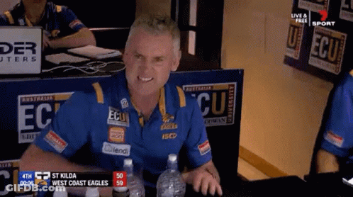 Man In Blue Shirt Saying EC GIF