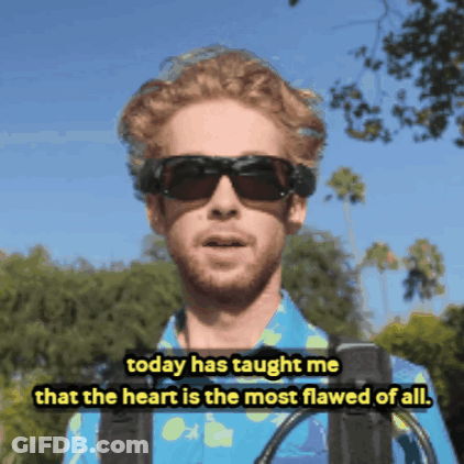 Man In Blue Shirt Saying Heart Is Most Flawed GIF