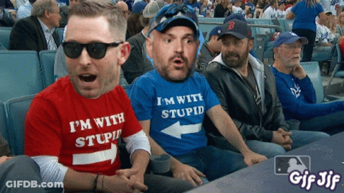 Man In Blue Shirt Saying I'm With Stupid GIF