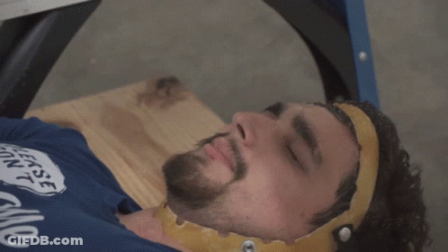 Man In Blue Shirt Saying Jokes On You I'm Not Ticklish Laying Down GIF
