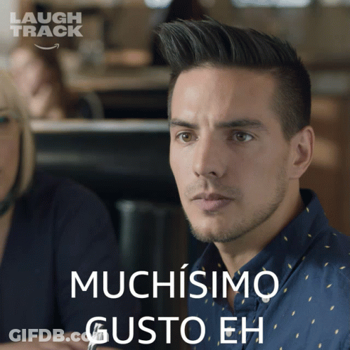 Man In Blue Shirt Saying Muchisimo GIF