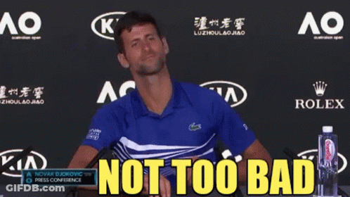 Man In Blue Shirt Saying Not Too Bad In Front Of Rolex And Kia Logos GIF