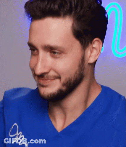 Man In Blue Shirt Saying Om GIF